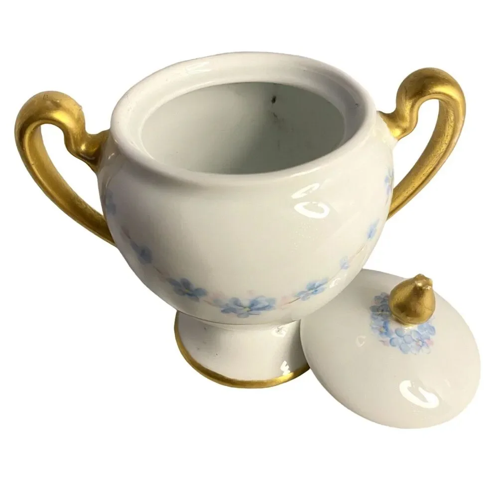 #8191 VINTAGE MADE IN JAPAN SUGAR BOWL AND CREAMER WITH LIGHT BLUE FLOWERS